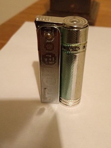 Vintage petrol lighter working